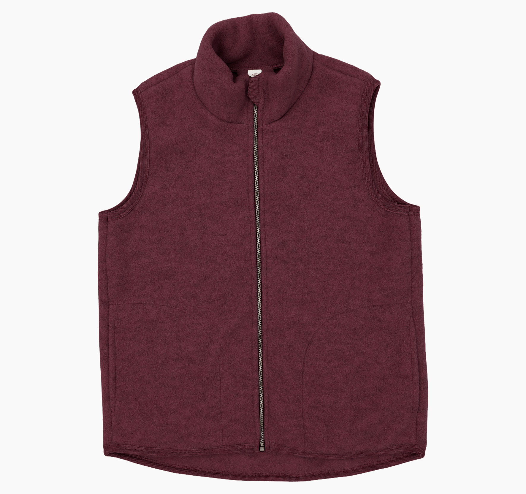 Women's fleece vest made from 100% virgin merino wool, featuring two large pockets and a zipper.